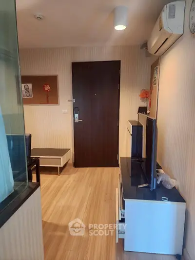 Modern apartment interior with wooden flooring and stylish decor