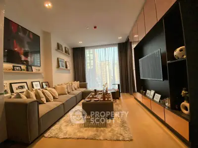 Luxurious modern living room with elegant decor and city view, featuring a spacious sofa and stylish shelving.