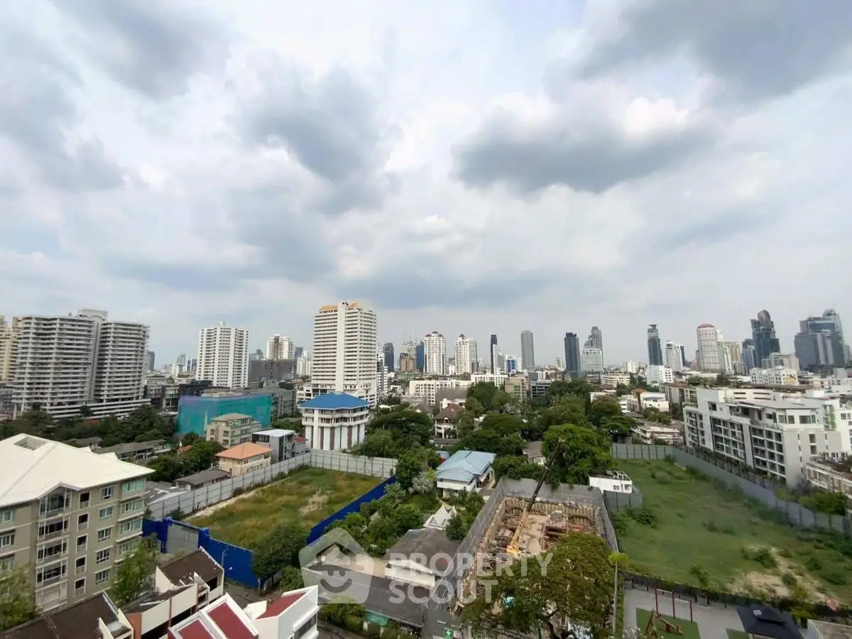 Stunning cityscape view showcasing urban skyline and lush greenery