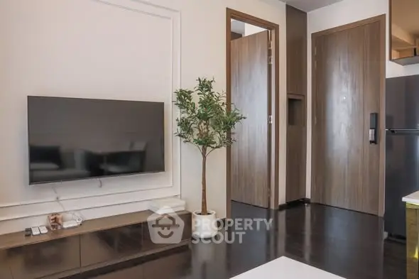 Modern living room with sleek TV setup and stylish decor