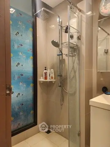 Modern bathroom with sleek shower design and colorful window panel
