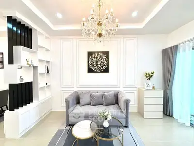 Elegant living room with chandelier and modern decor