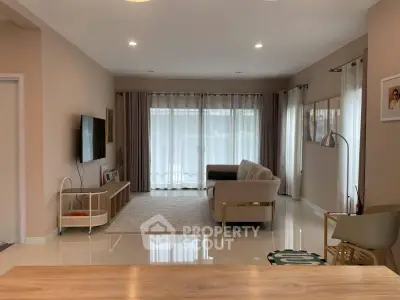 Spacious modern living room with elegant decor and natural light