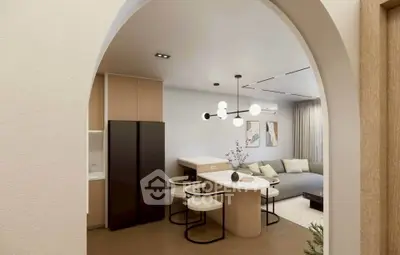 Modern open-layout living room with stylish furniture and elegant lighting