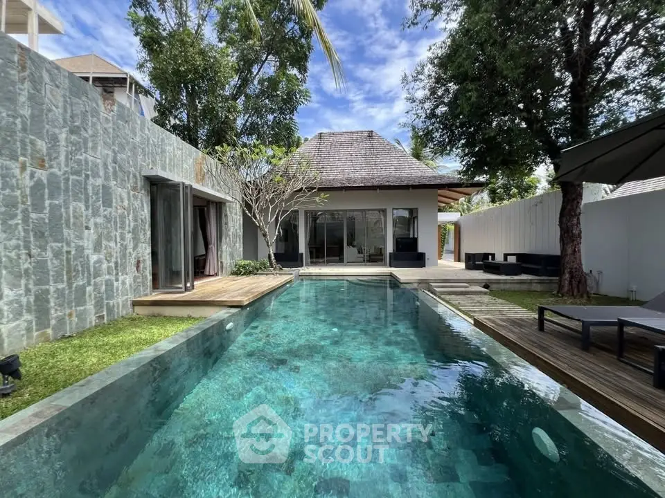 Luxurious villa with private pool and lush garden, perfect for serene living and relaxation.