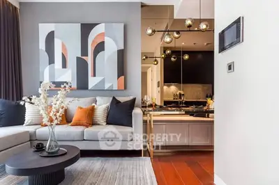 Modern living room with stylish decor and open kitchen layout