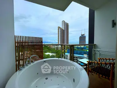 Luxurious balcony with jacuzzi and stunning city view