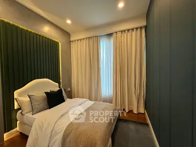 Cozy bedroom with elegant decor and soft lighting, featuring a plush bed and stylish curtains.