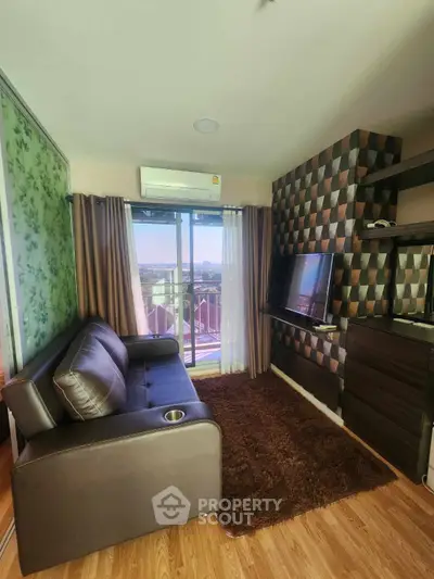 Modern living room with stylish decor and balcony view