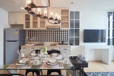 Modern kitchen and dining area with stylish decor and open layout
