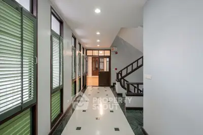 Spacious hallway with modern design and natural lighting