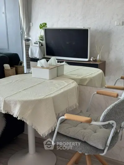 Cozy living room with modern decor and TV setup