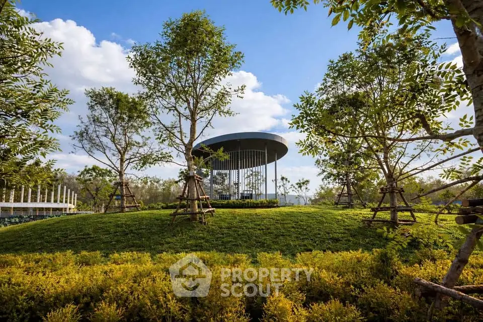 Stunning landscaped garden with modern architectural pavilion and lush greenery