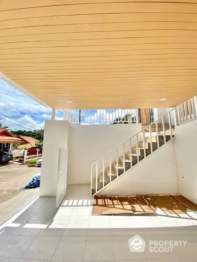 Modern exterior staircase with sleek design and bright natural lighting