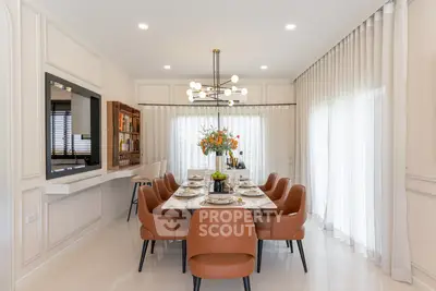 Elegant dining room with modern chandelier and stylish decor