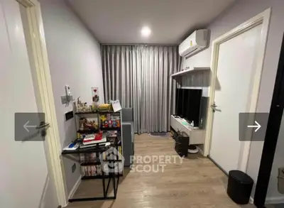 Cozy living room with modern decor and air conditioning