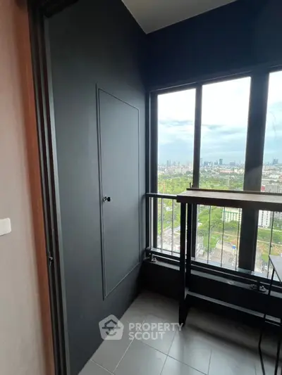 Modern balcony with stunning city view, perfect for relaxation and enjoying the skyline.