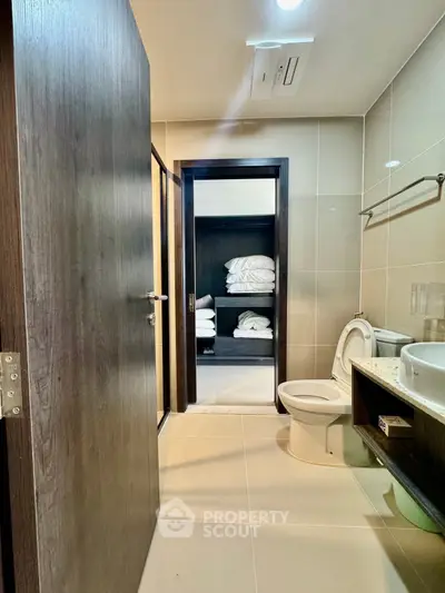 Modern bathroom with sleek design and ample storage space