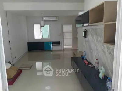 Spacious unfurnished living room with modern design and sleek flooring