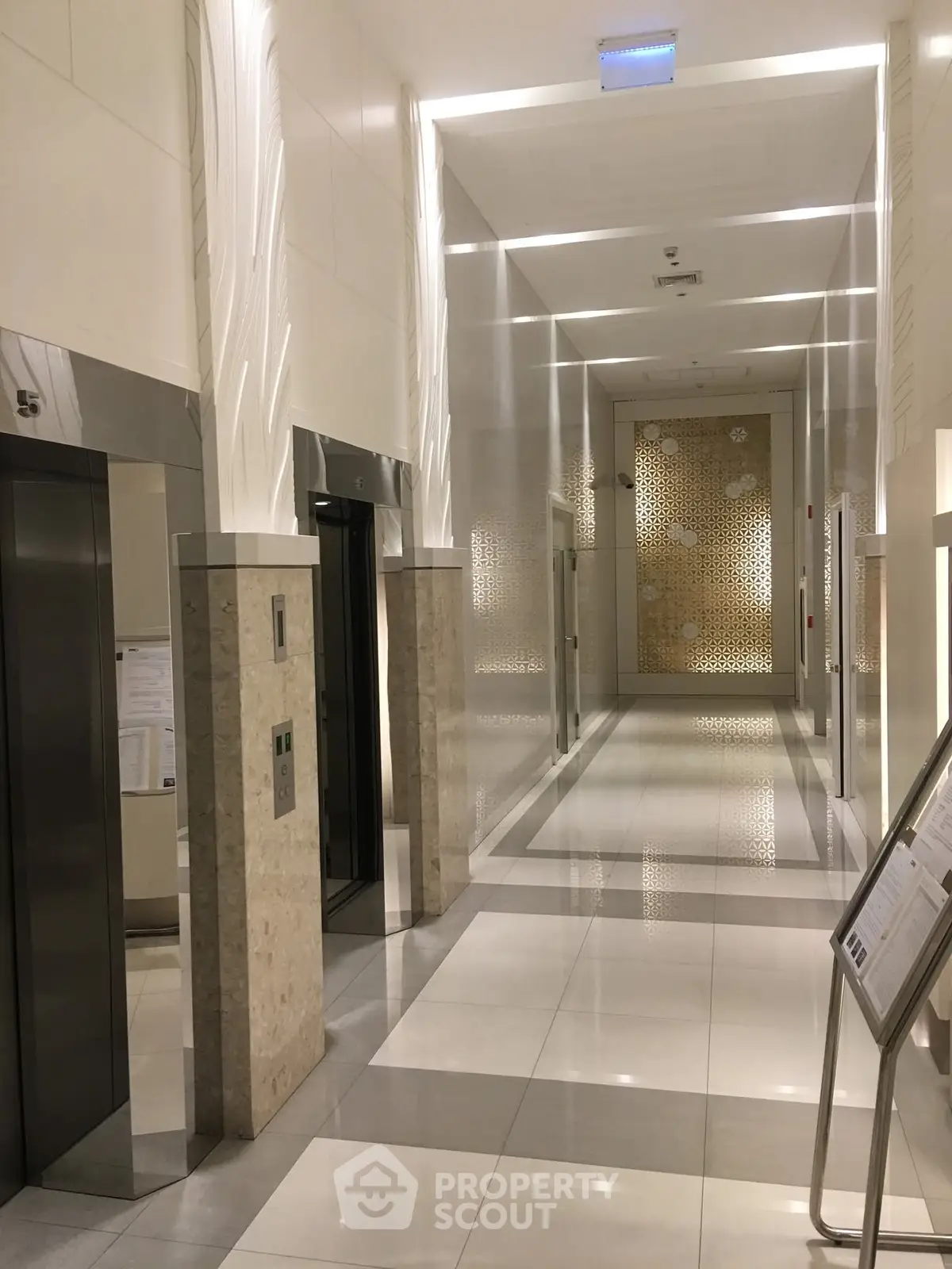 Luxurious modern elevator lobby with elegant design and ambient lighting