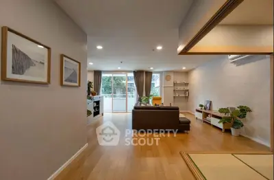 Spacious living room with wooden flooring and modern decor