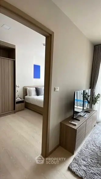 Modern apartment interior with cozy bedroom and stylish living area