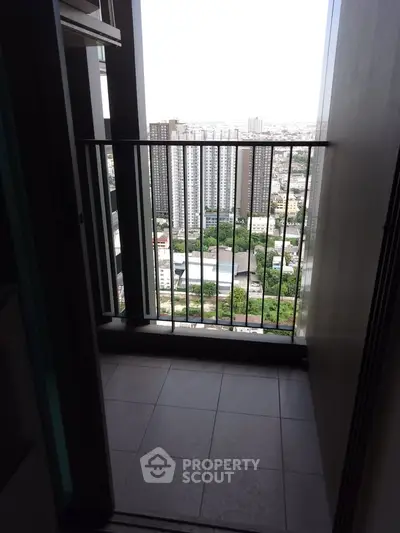 High-rise apartment balcony with stunning cityscape view