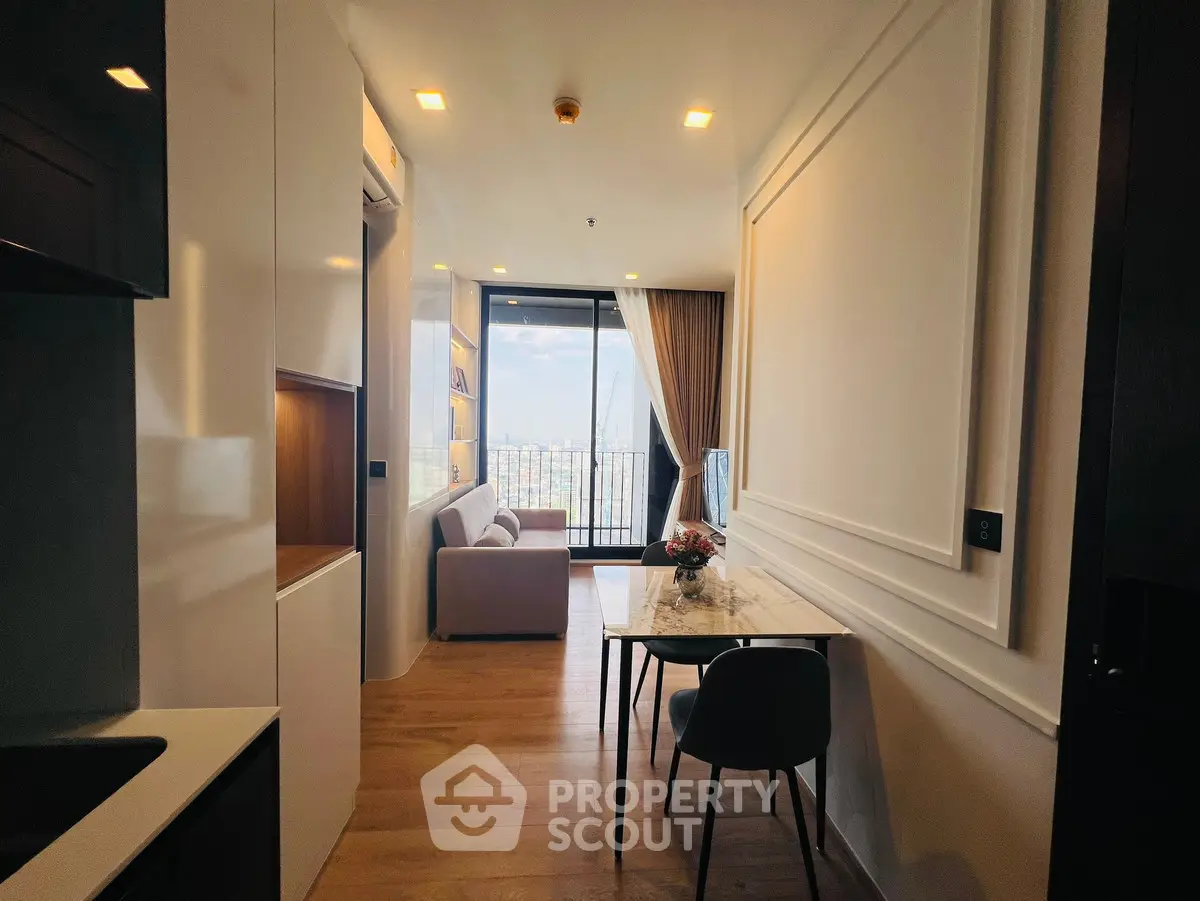 Modern apartment interior with open layout and balcony view