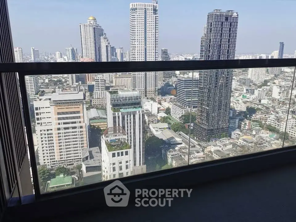 Stunning cityscape view from high-rise balcony with modern skyline