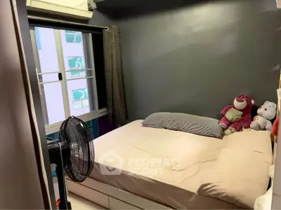 Cozy bedroom with plush toys and modern decor in urban apartment