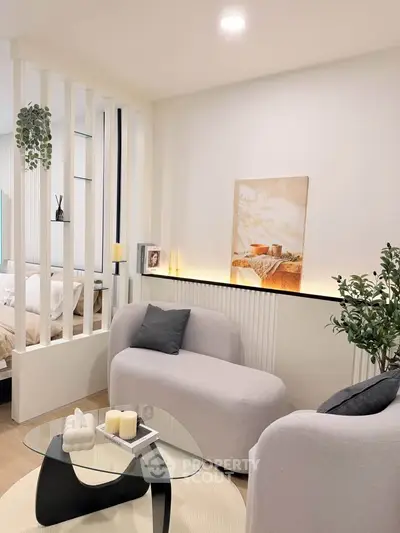 Stylish modern living room with elegant decor and cozy seating area, perfect for relaxation and entertaining.