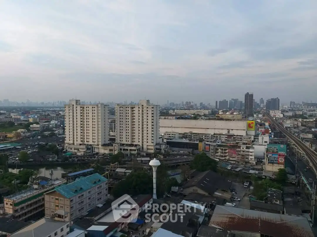 Panoramic cityscape view showcasing urban residential buildings and skyline.