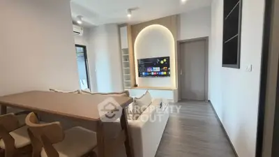 Modern living room with stylish furniture and built-in TV unit, perfect for contemporary living.