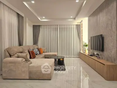 Luxurious modern living room with elegant decor and spacious seating area.