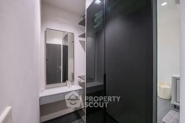 Modern bathroom with sleek design and ample storage space