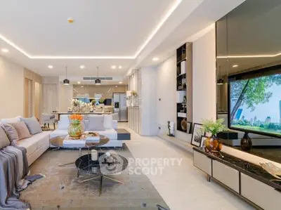 Luxurious modern living room with elegant decor and open layout, perfect for entertaining.