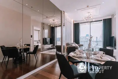 Luxurious open-plan living space with elegant dining set, modern lighting, and panoramic city views through floor-to-ceiling windows.