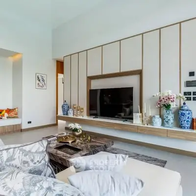 Luxurious modern living room with elegant decor and built-in TV unit