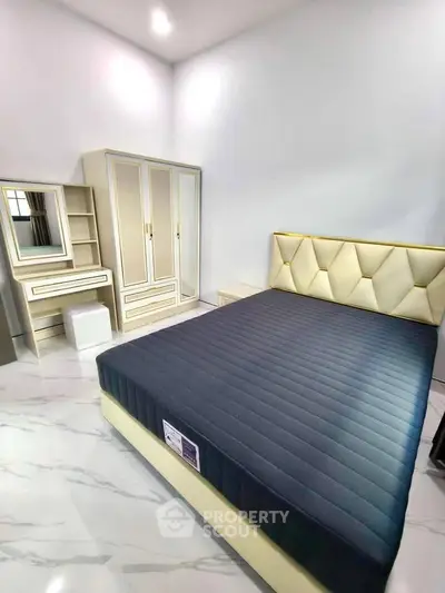 Modern bedroom with stylish furniture and elegant design