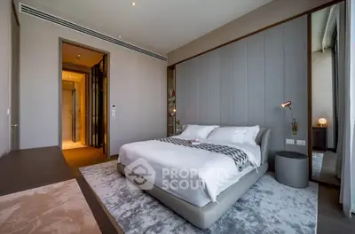 Luxurious modern bedroom with elegant decor and plush bedding