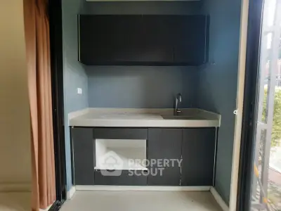 Modern kitchen with sleek cabinetry and minimalist design, perfect for contemporary living.