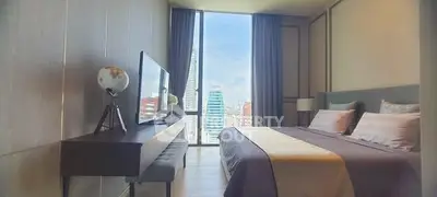 Luxurious bedroom with stunning city view and modern decor