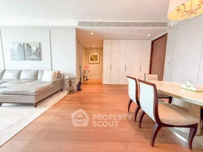 Spacious living room with elegant dining area and modern decor