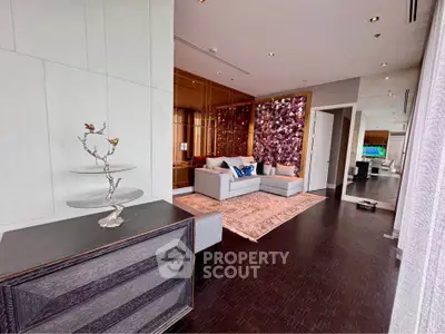 Luxurious living room with elegant decor and modern furniture, featuring a stunning accent wall and spacious layout.