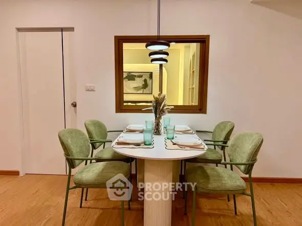 Stylish dining area with modern decor and elegant lighting, perfect for entertaining guests.