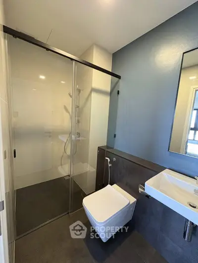 Modern bathroom with sleek shower and contemporary fixtures