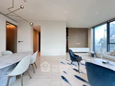 Luxurious modern living room with city view, elegant furniture, and stylish decor in high-rise apartment.