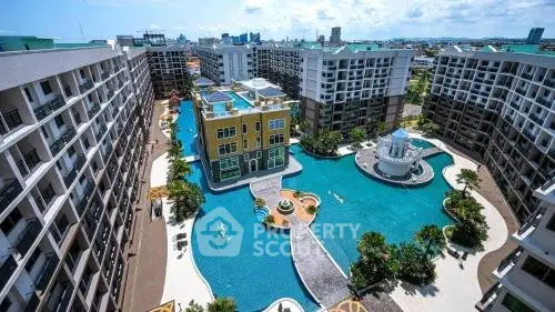 Luxurious condominium complex with stunning pool and modern architecture