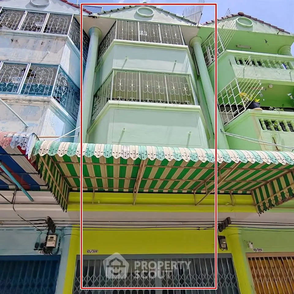 Charming building exterior with unique architectural design and vibrant colors.