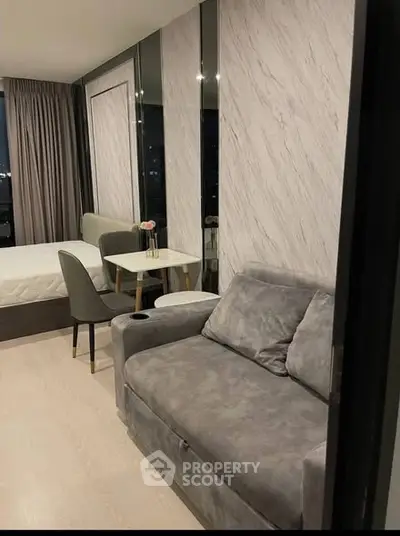 Modern studio apartment with stylish decor and cozy furnishings